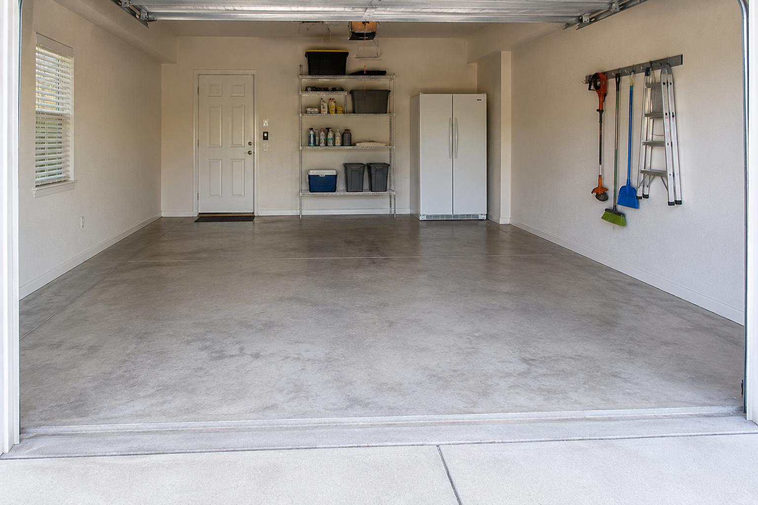 The same garage completely cleared and clean after a Get Junk Free cleanout
